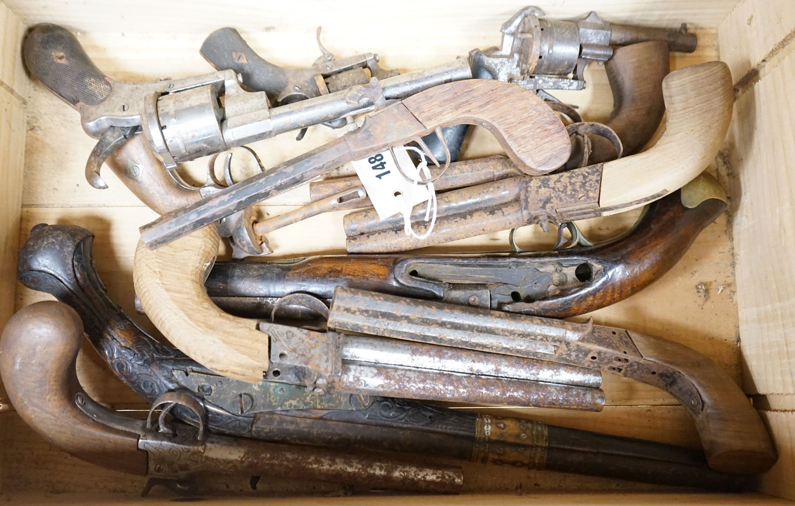 A group of percussion cap pistols and pin fire revolvers, 19th century, for restoration.